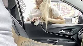 A curvy blonde stranger hops into my car for a wet adventure on the street