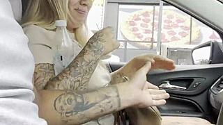 A curvy blonde stranger hops into my car for a wet adventure on the street