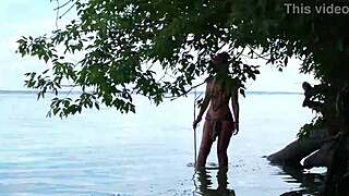Topless mature babe fishes outdoors with massive harpoon in public homemade amateur exposure