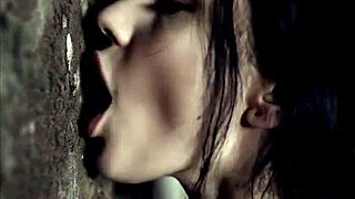 dark haired babe passionately kissing and licking a wall weird fetish - ai generated