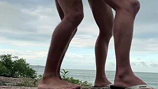 two gays enjoy quick bareback anal on beach