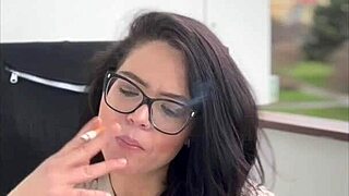 smoking cigarettes in glasses while showing natural tits outdoors